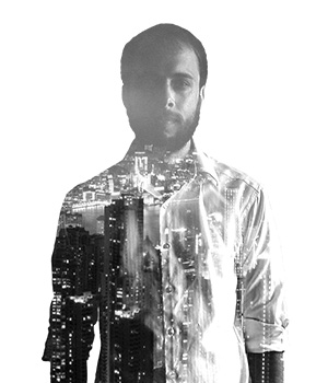 The silhoutte of a bearded man wearing a dress shirt attempting to look professional